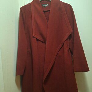 WOOL SURL COAT.